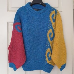NWOT. Woman's Relax fit sweater with design.